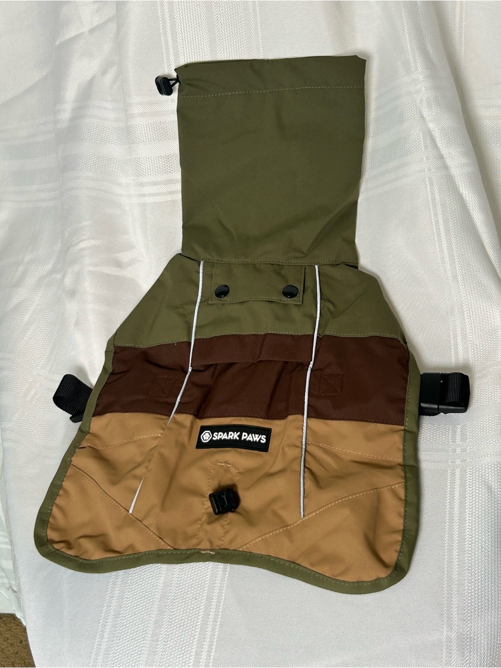 Dog clothes medium sized. Raincoat, water and wind proof, reflective detailing.